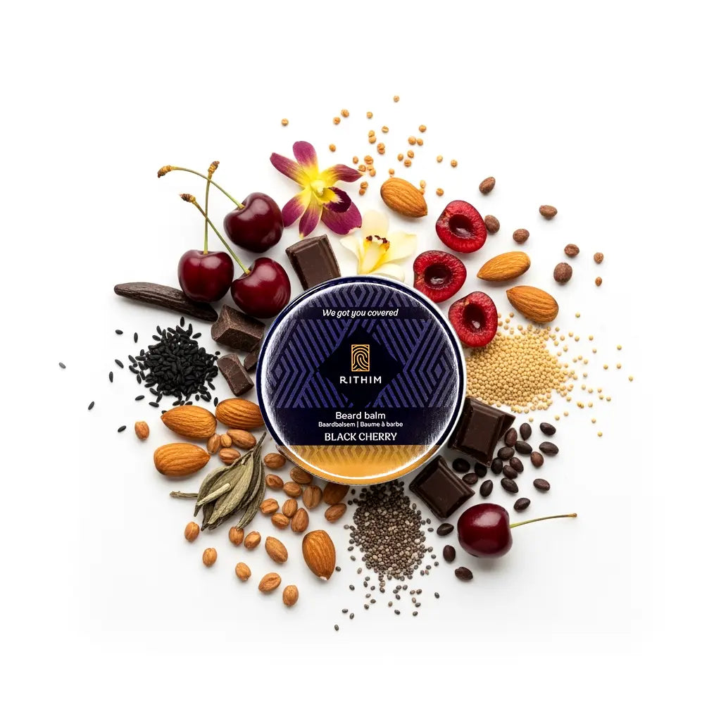 Rithim Black Cherry beard balm container surrounded by black cherry, almonds, chocolate and other ingredients on a white background